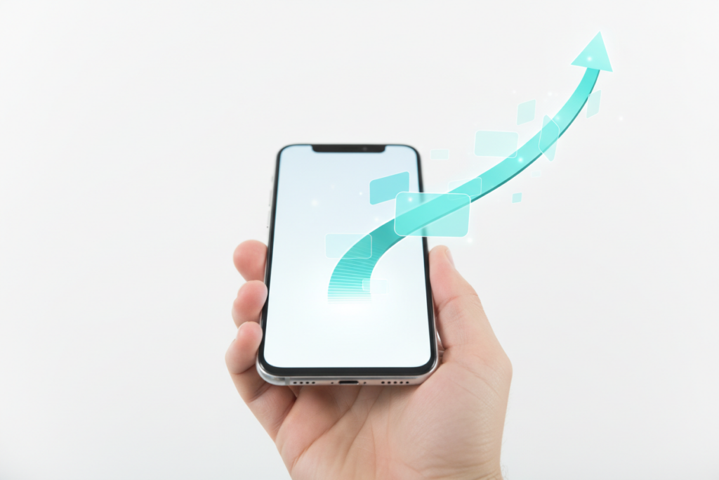 Hand holding smartphone with a glowing digital roadmap path emerging toward business success.